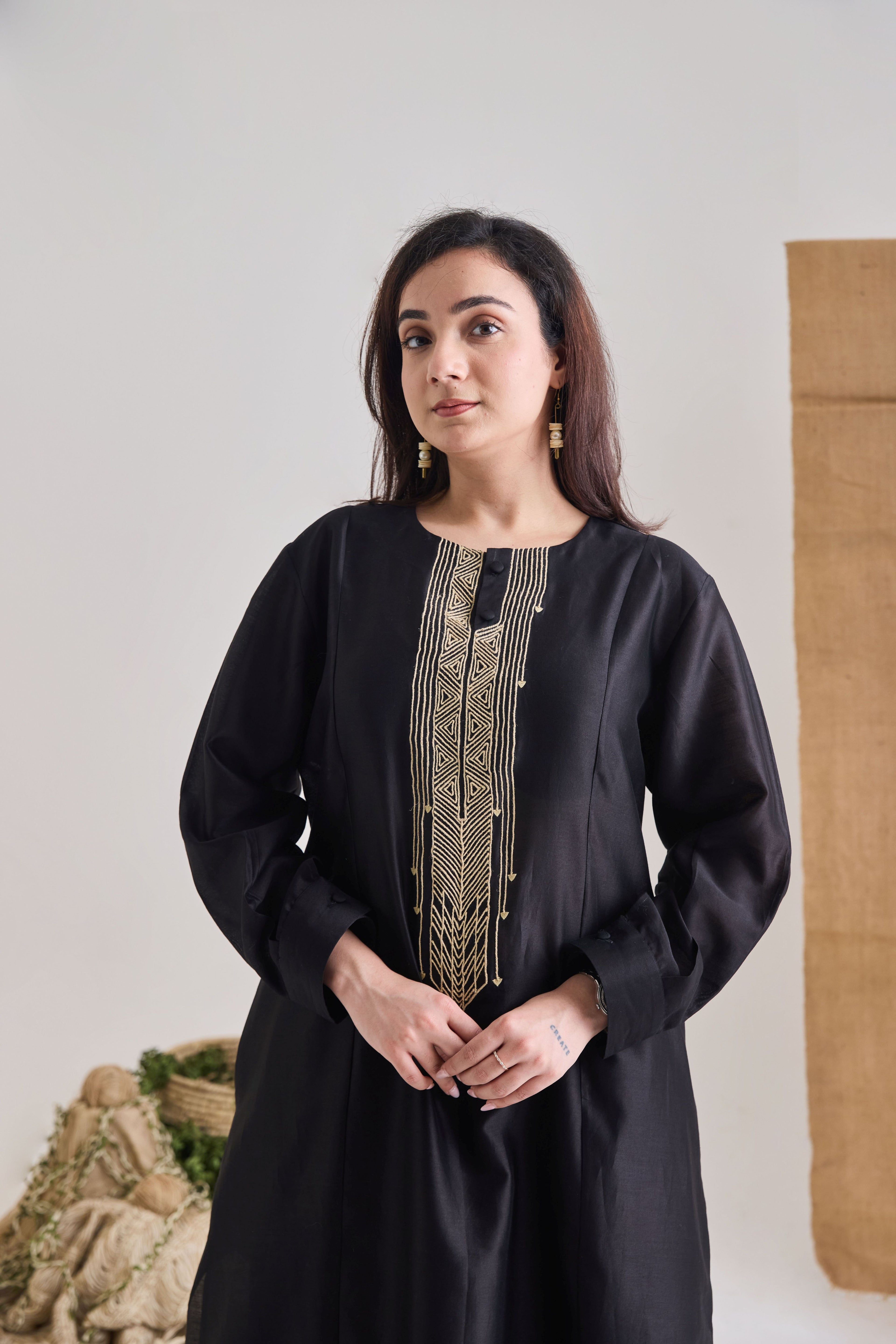 Black Chanderi kurta with raw jute embroidery on neckline and long sleeves with cuff