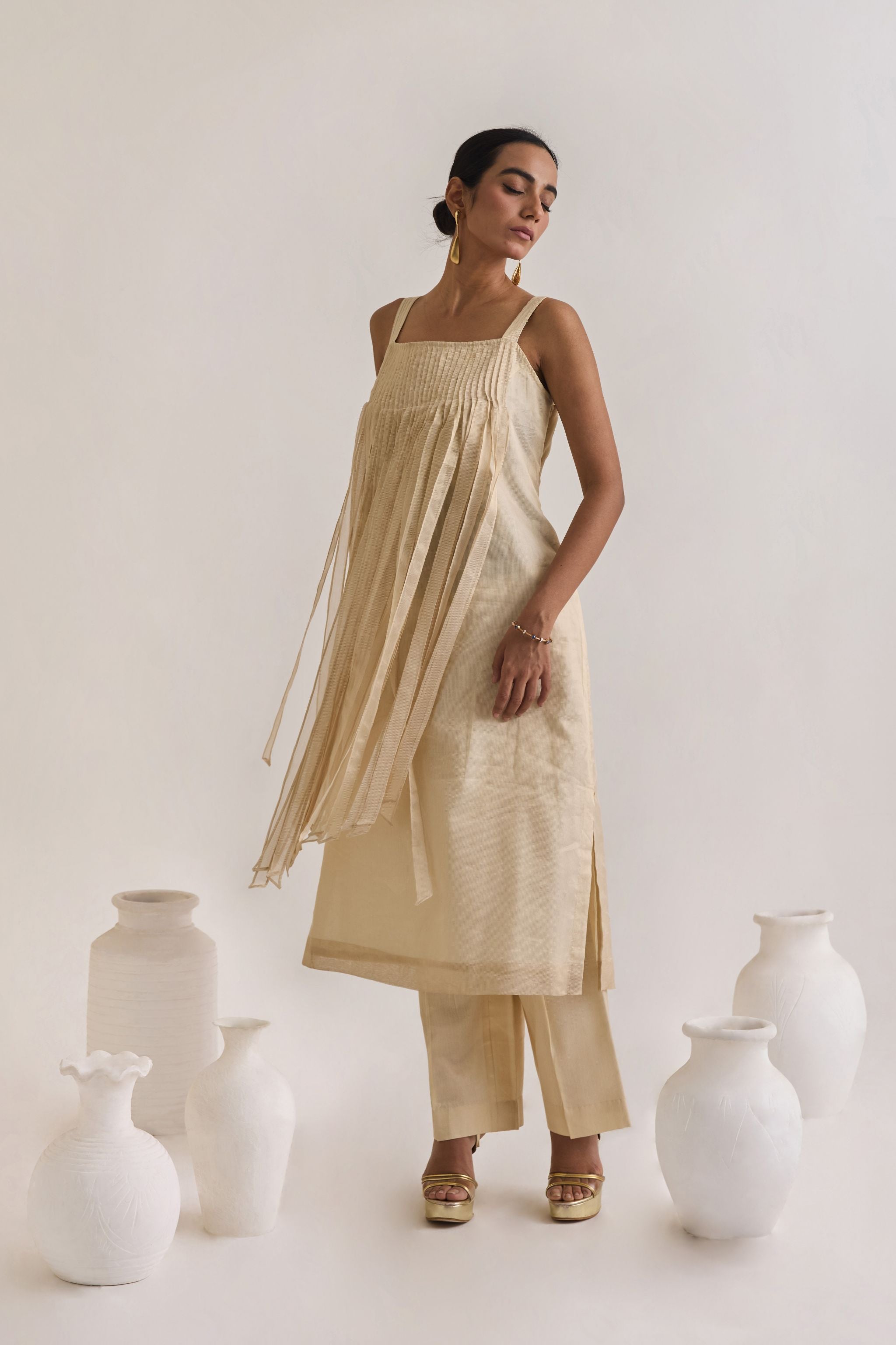 Front view of Chanderi set with a Fringed stripes Kurta ton front and crease pants