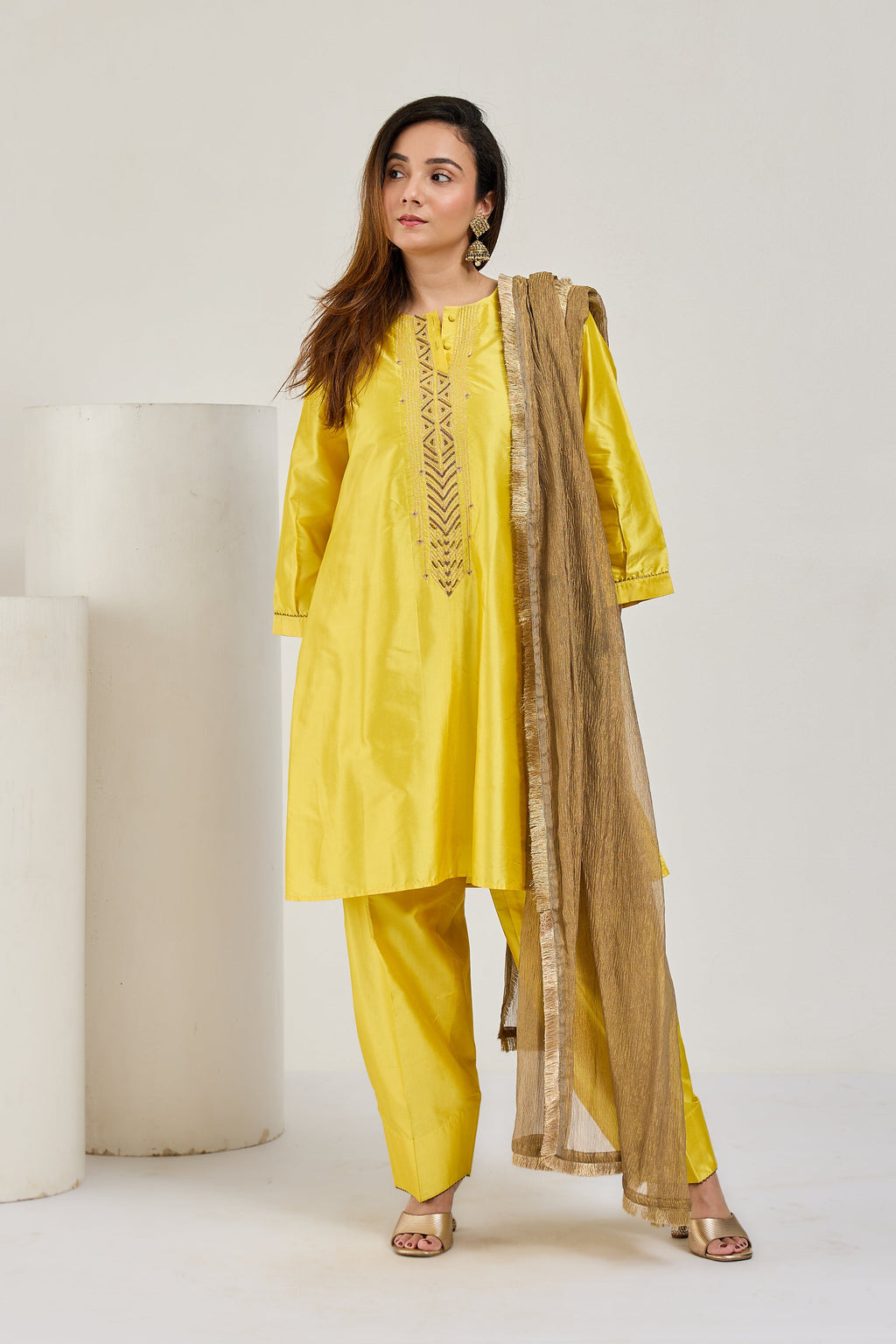 Bright yellow Katan silk farshi salwar suit with crushed tissue dupatta by Essence by Monika, front view