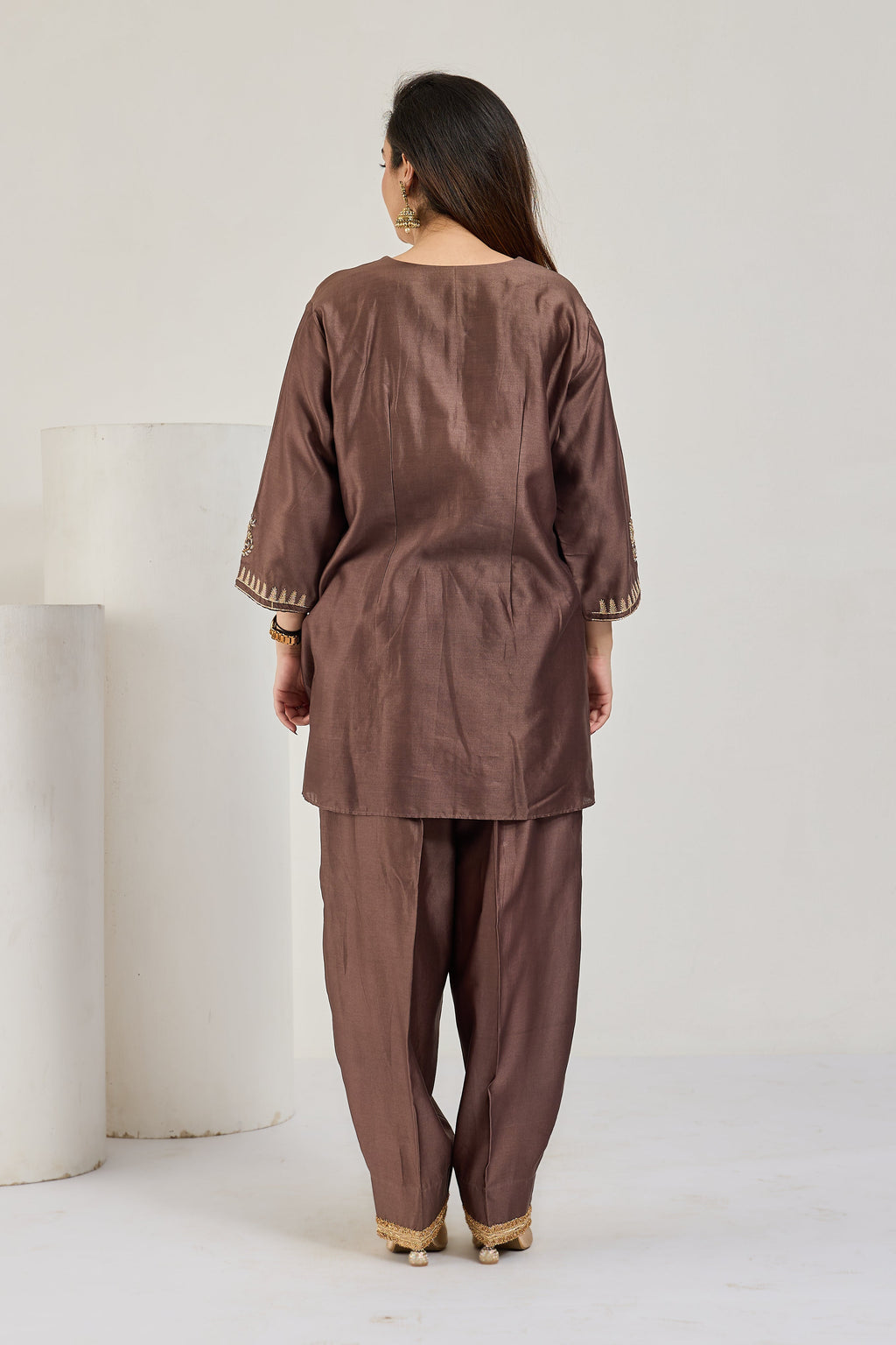 Brown Chanderi short kurta and cocoon pants with gold lace-edged hems, back view