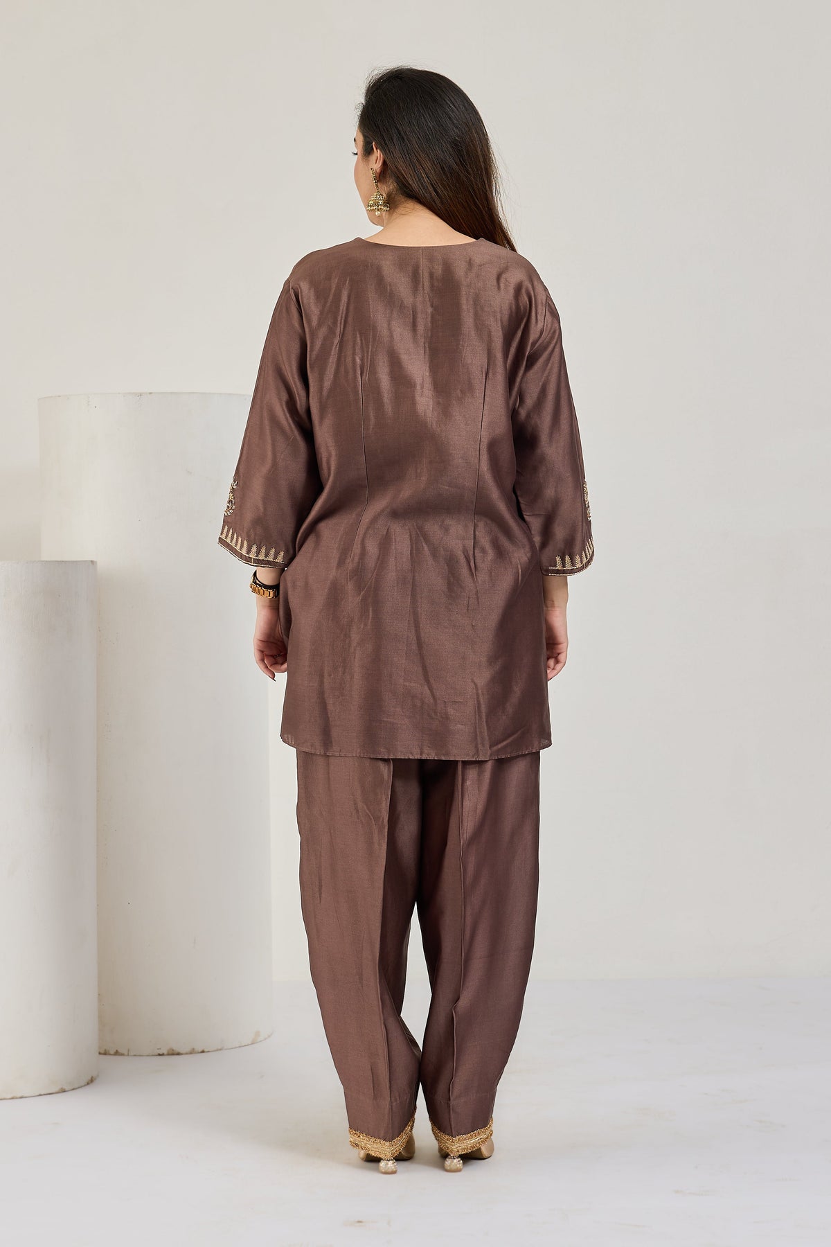 Brown Chanderi short kurta and cocoon pants with gold lace-edged hems, back view
