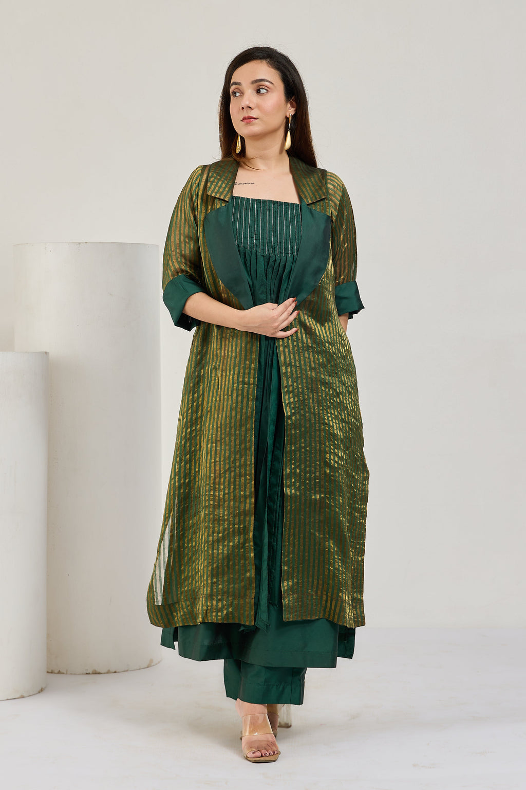 Dark green silk strappy kurta set with long sheer striped tissue Chanderi coat by Essence by Monika, front view
