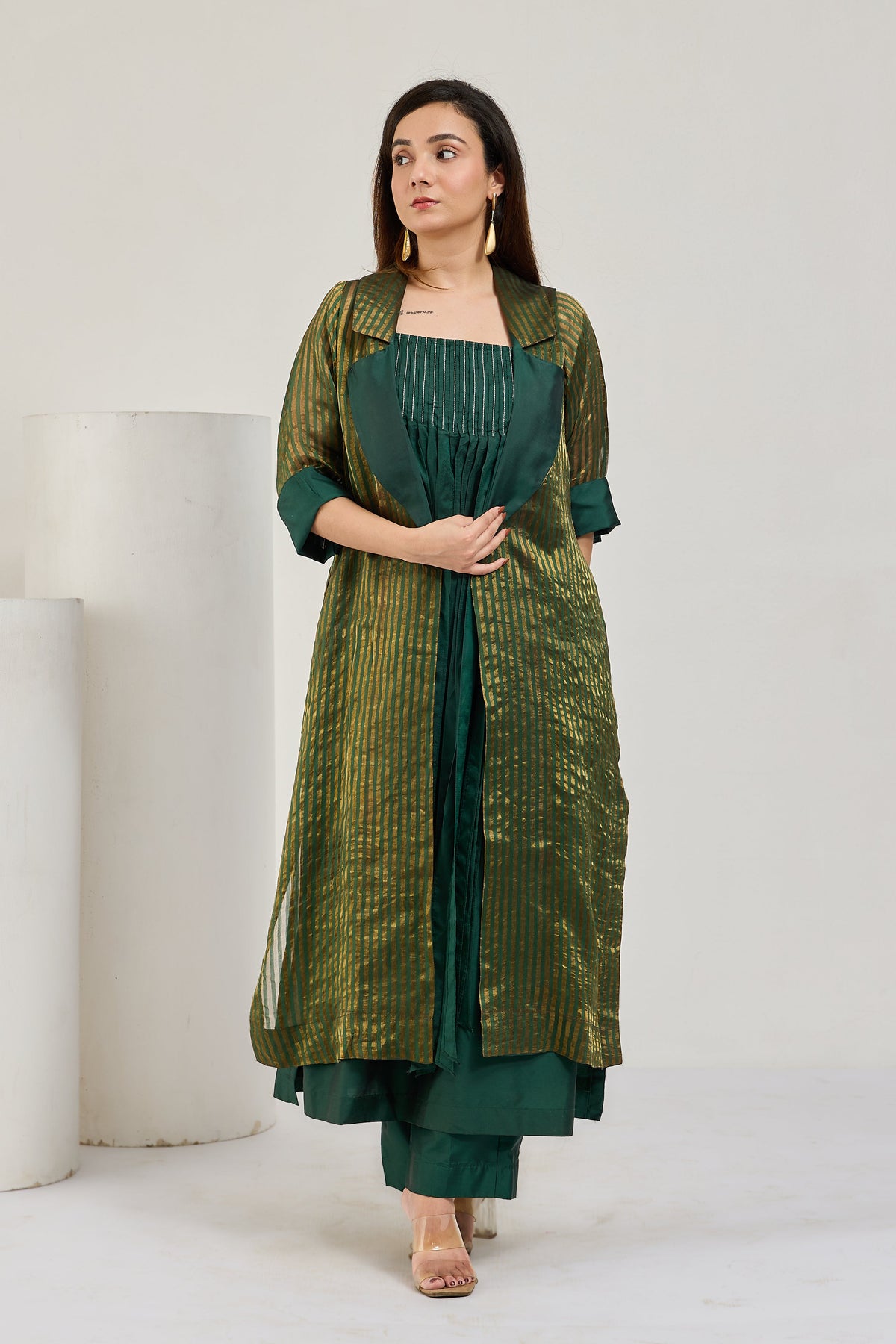 Dark green silk strappy kurta set with long sheer striped tissue Chanderi coat by Essence by Monika, front view