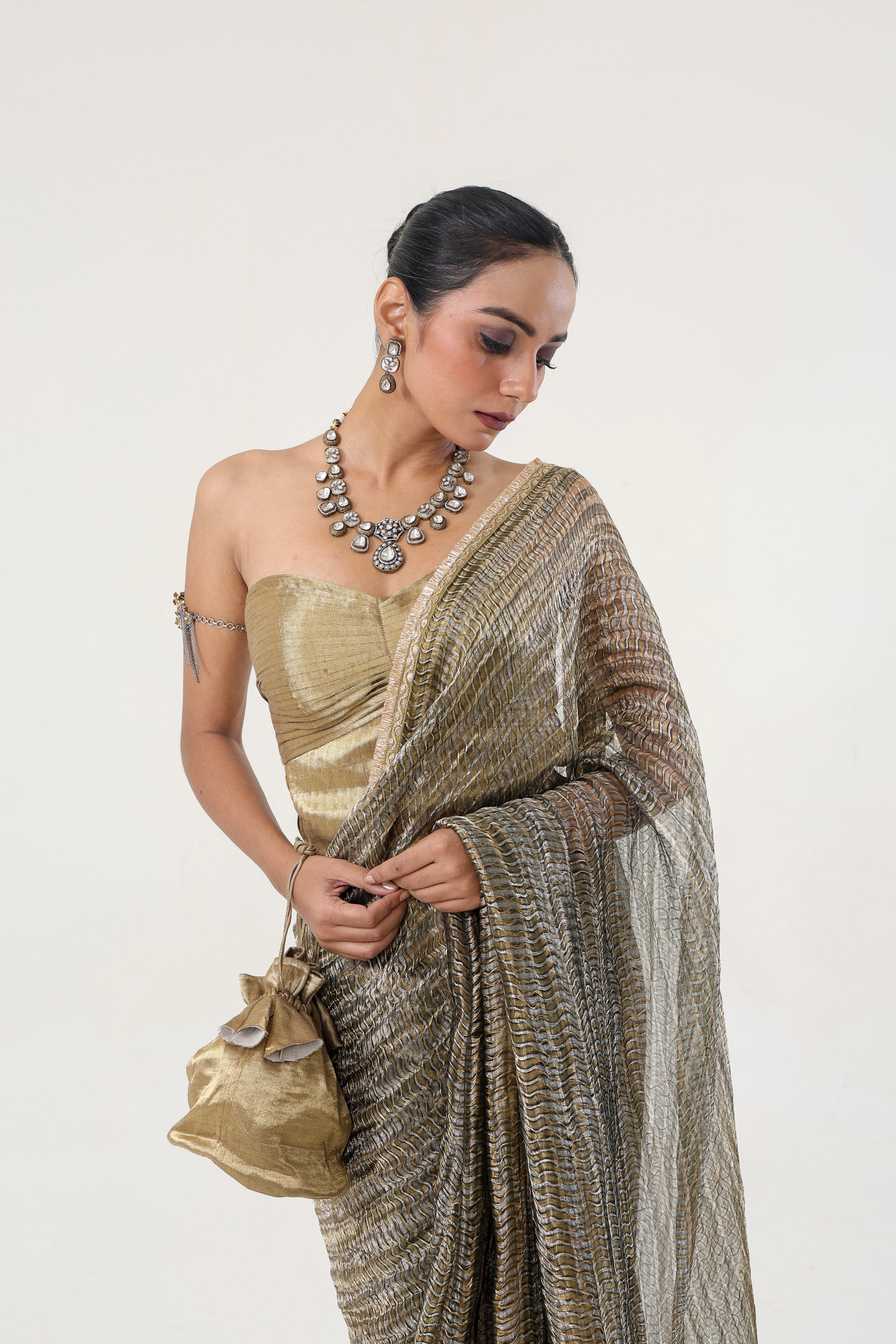 Green Metallic Tissue Organza Saree with Tilla Border - fabric and embroidery detail | Essence by Monika