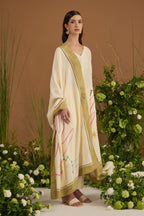 Champagne with green border Dupatta - side silhouette | Essence by Monika