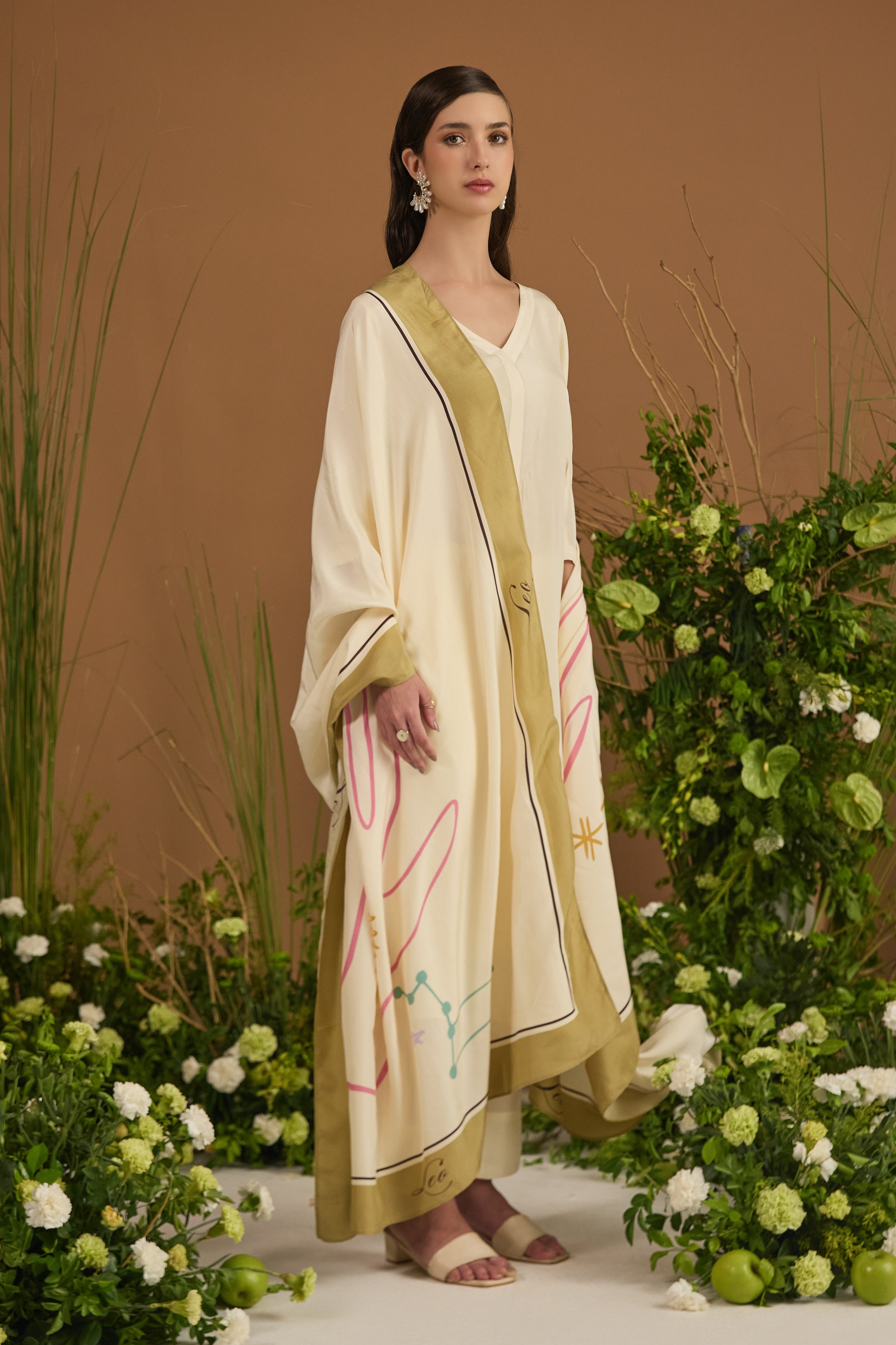 Champagne with green border Dupatta - side silhouette | Essence by Monika