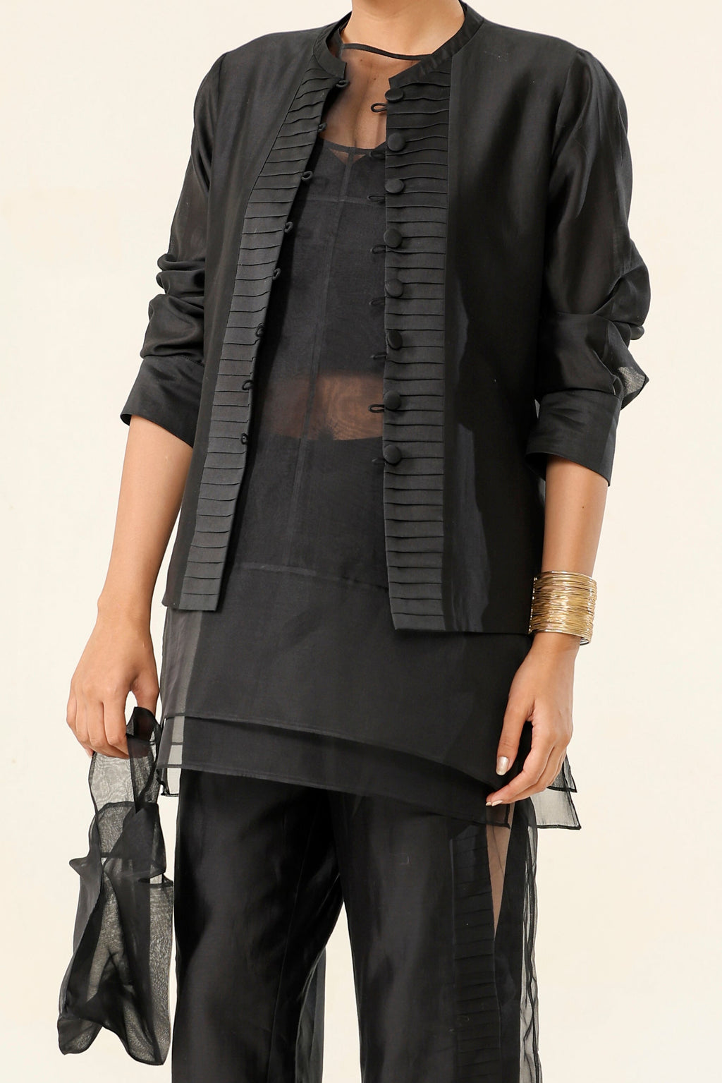 Midnight Black Pleated Coat Set with Sheer Panel Pants - fabric and embroidery detail | Essence by Monika