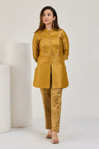 Mustard gold Banarasi Kimkhab and tissue kurta with tissue pants by Essence by Monika, front view