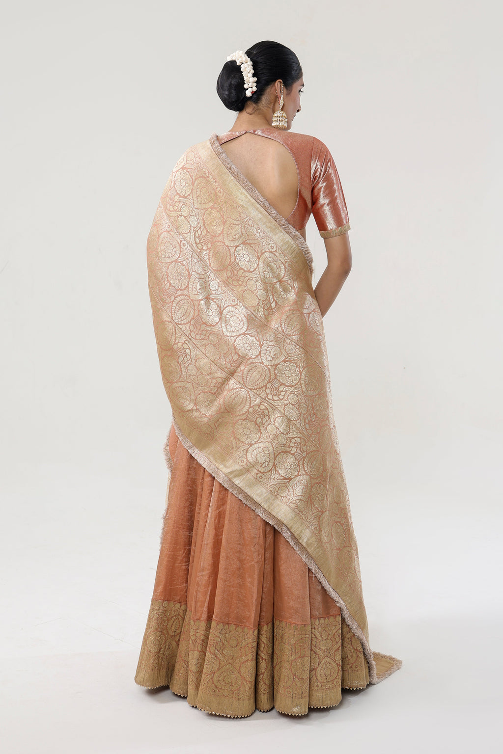 Peach Tissue Lehenga with Banarasi Munga Borders - back view | Essence by Monika