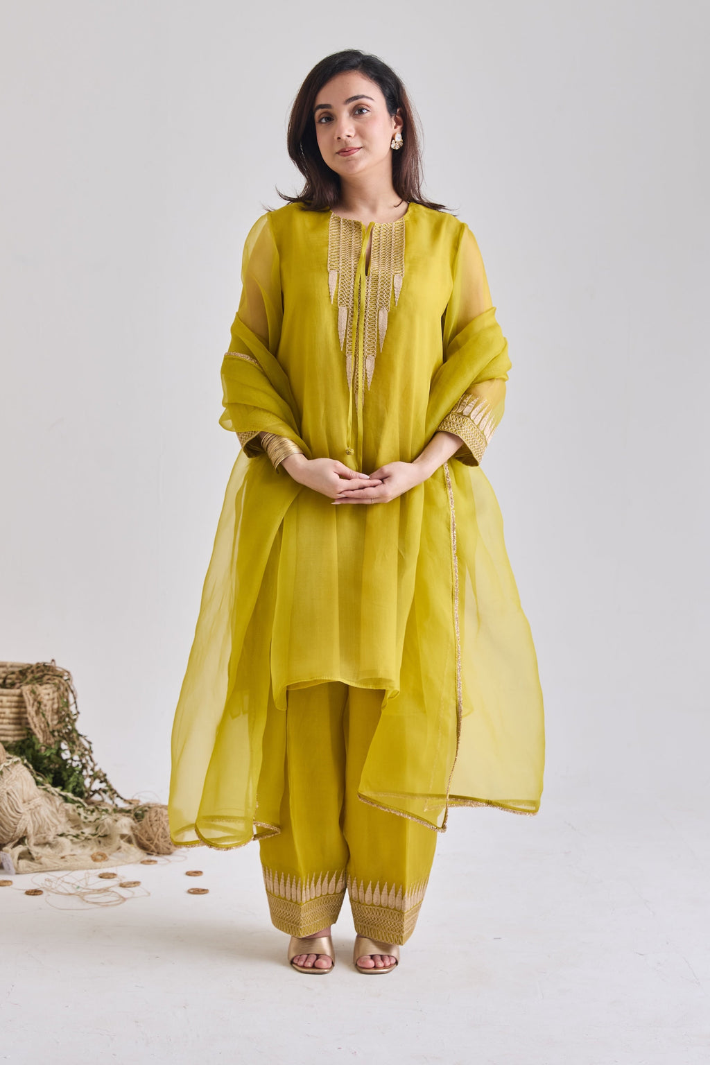 Yellow organza zari temple motif kurta set - front view | Essence by Monika