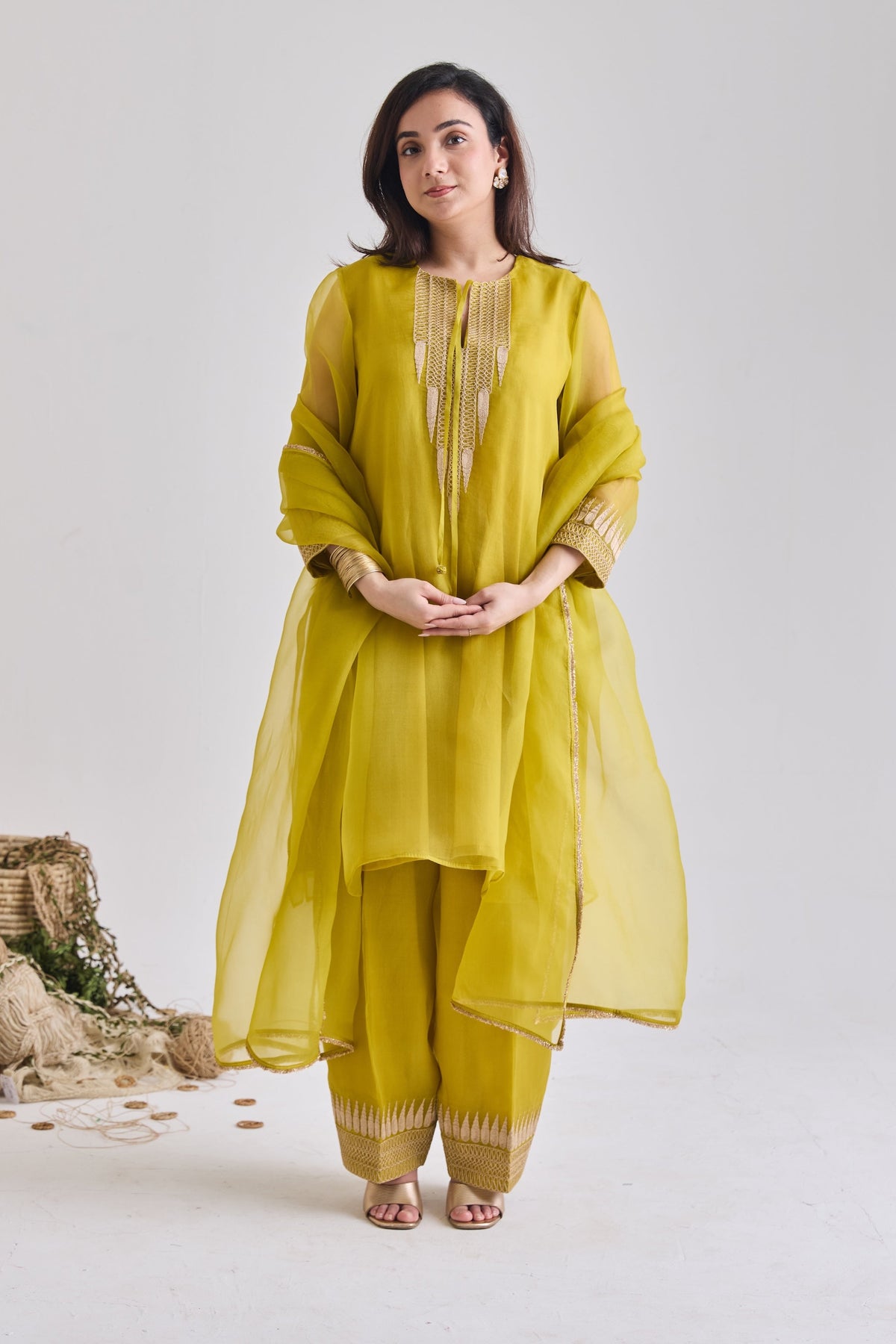 Yellow organza zari temple motif kurta set - front view | Essence by Monika