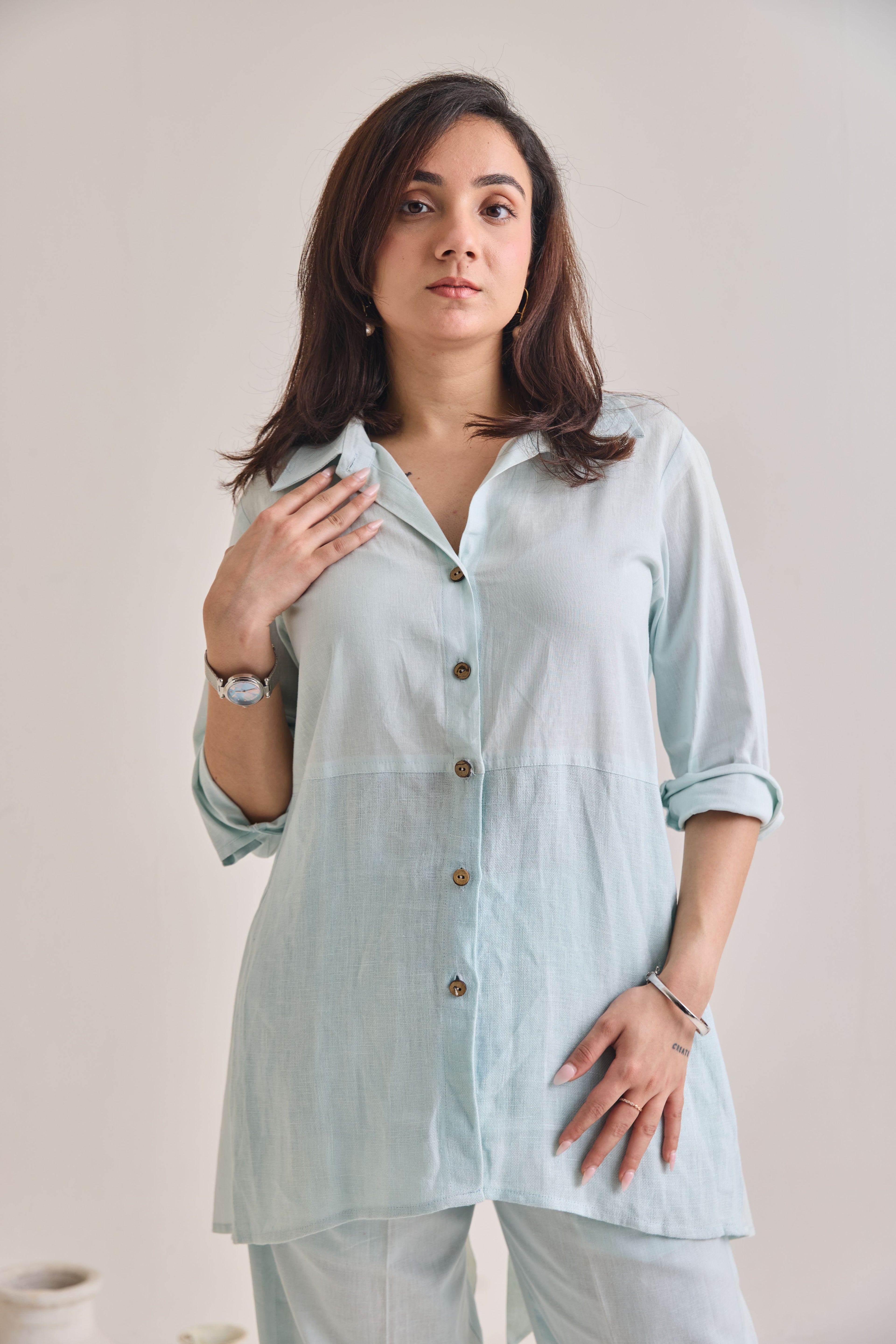 Front Close-up view of Pastel Blue Cotton-Linen Shirt with Sleeves rolled up.