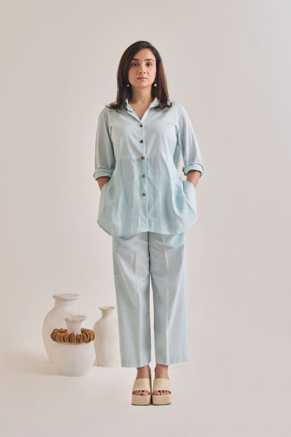 Front Profile of Pastel Blue Cotton-Linen Shirt with Sleeves rolled up and Pants with pockets
