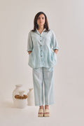Front Profile of Pastel Blue Cotton-Linen Shirt with Sleeves rolled up and Pants with pockets