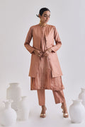 Front view of Pure tussar set with a pleated sleeveless dress, a coat which has long sleeves and a pair of tailored pants
