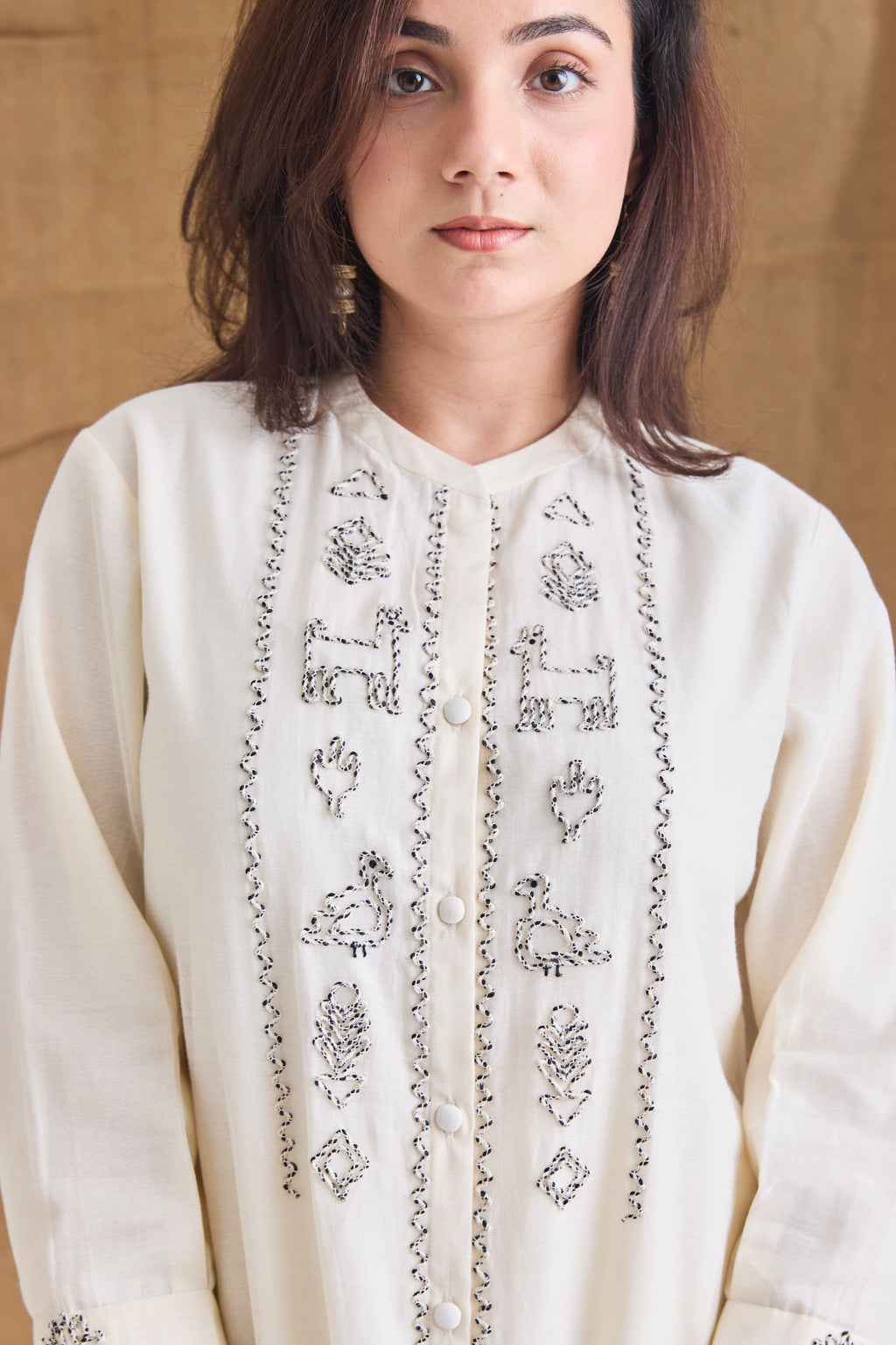 Detail – Handcrafted jute embroidery on white Chanderi
