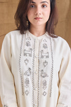 Detail – Handcrafted jute embroidery on white Chanderi